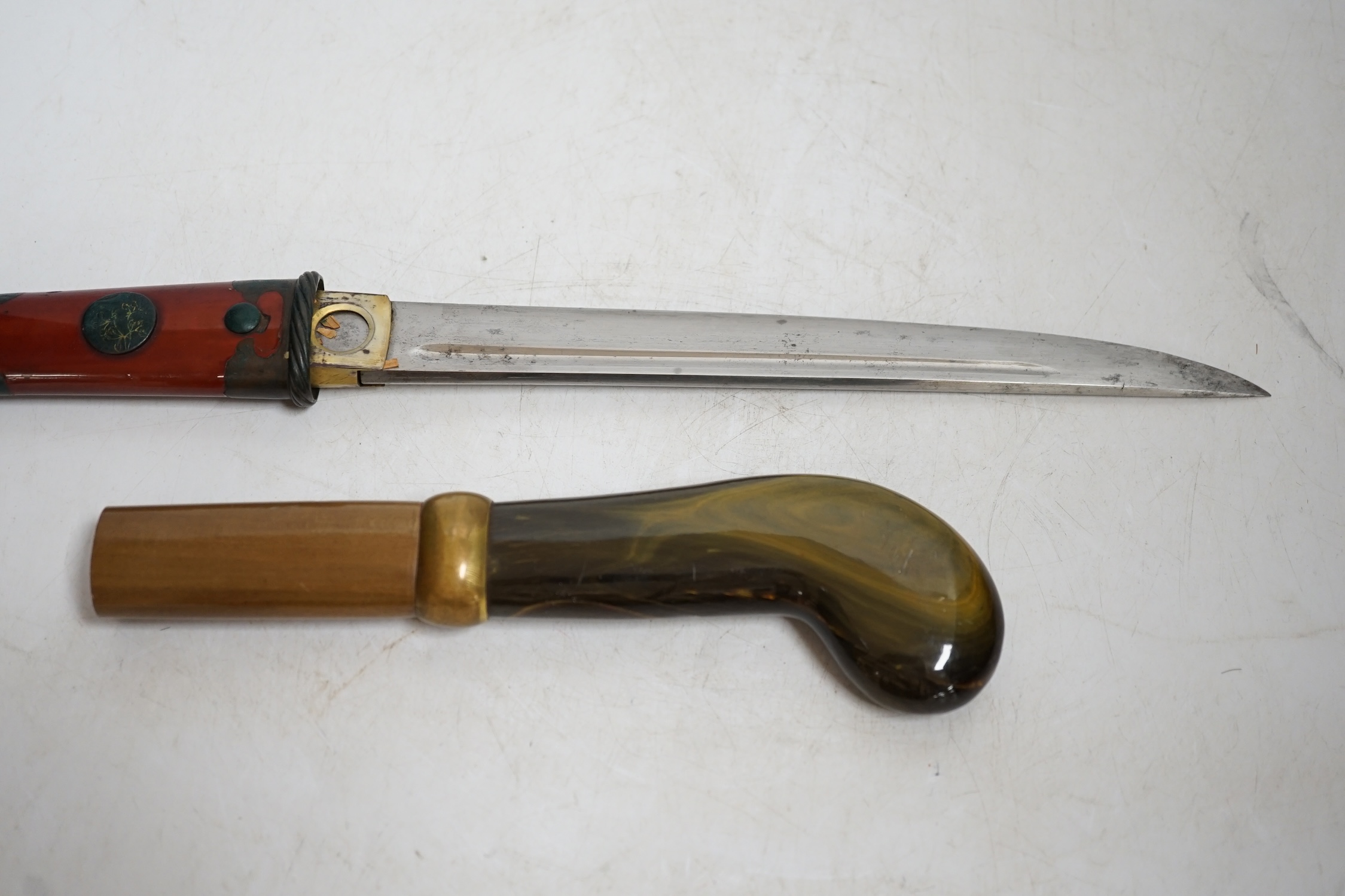 A Japanese knife in lacquered sheath and a handle, largest 34cm in length. Condition - fair to good